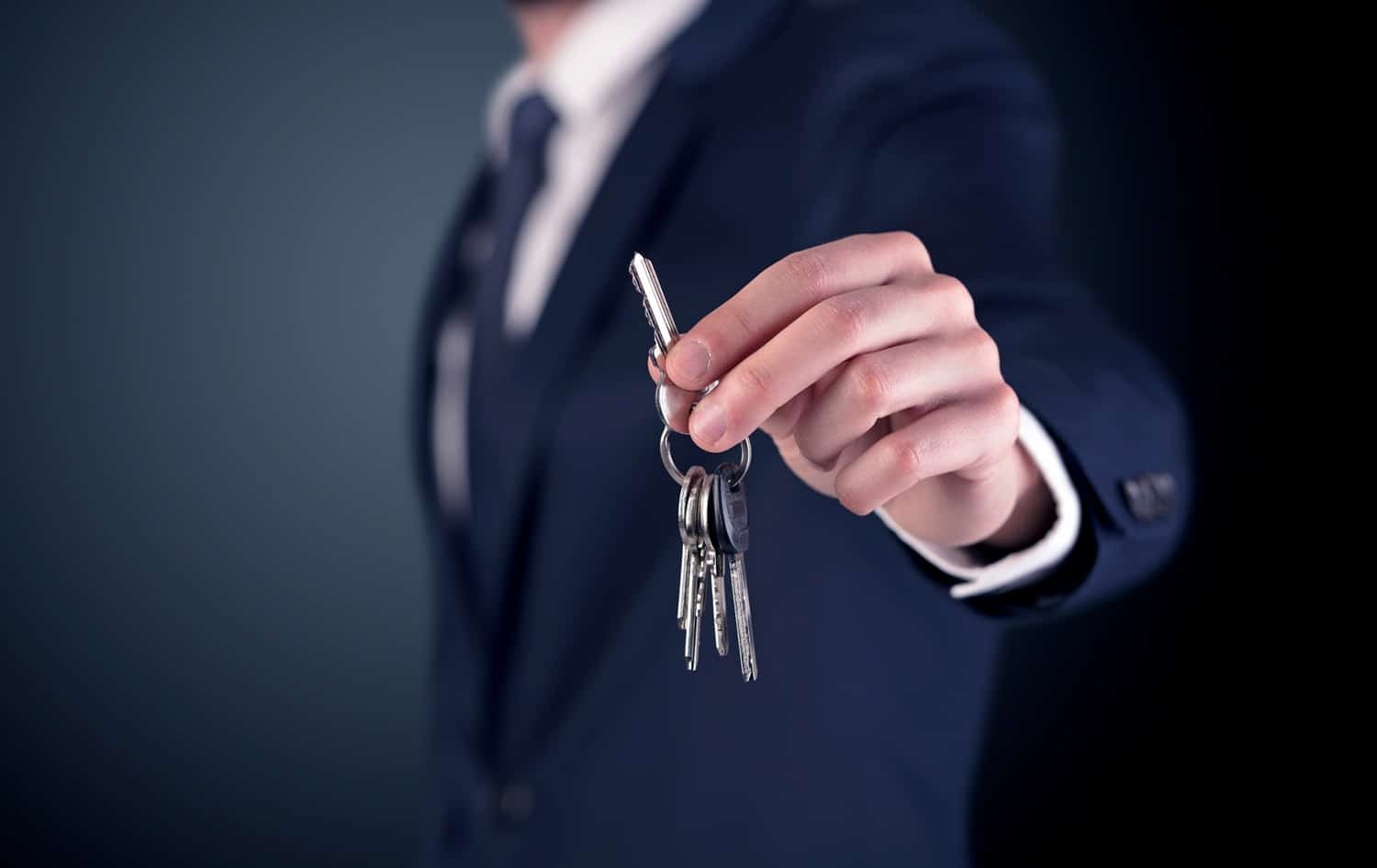 Picture of man with keys (asset sale)